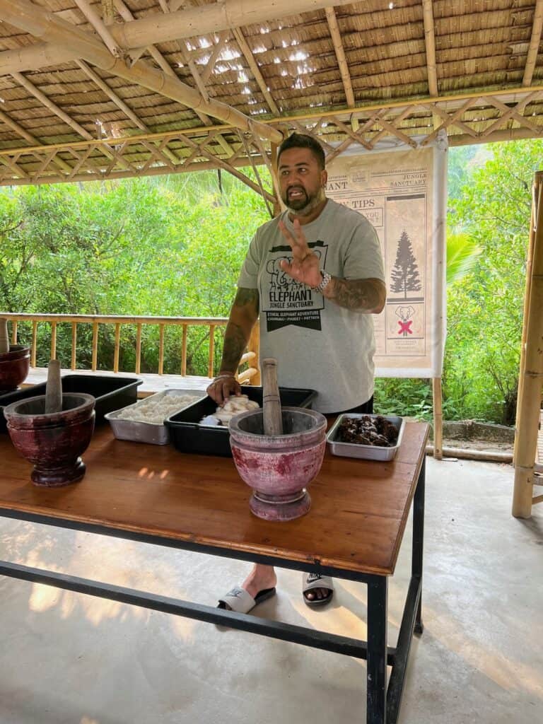 Teaching how to make food for elephants