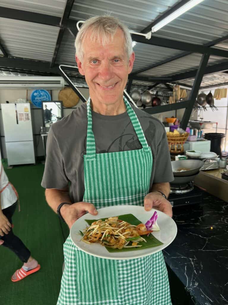 My husband proudly showing his successful Thai Dish