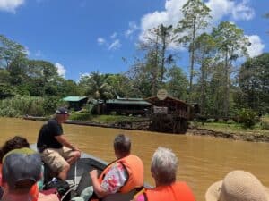 Bilit Adventure Lodge, river boat pulling up to the dock