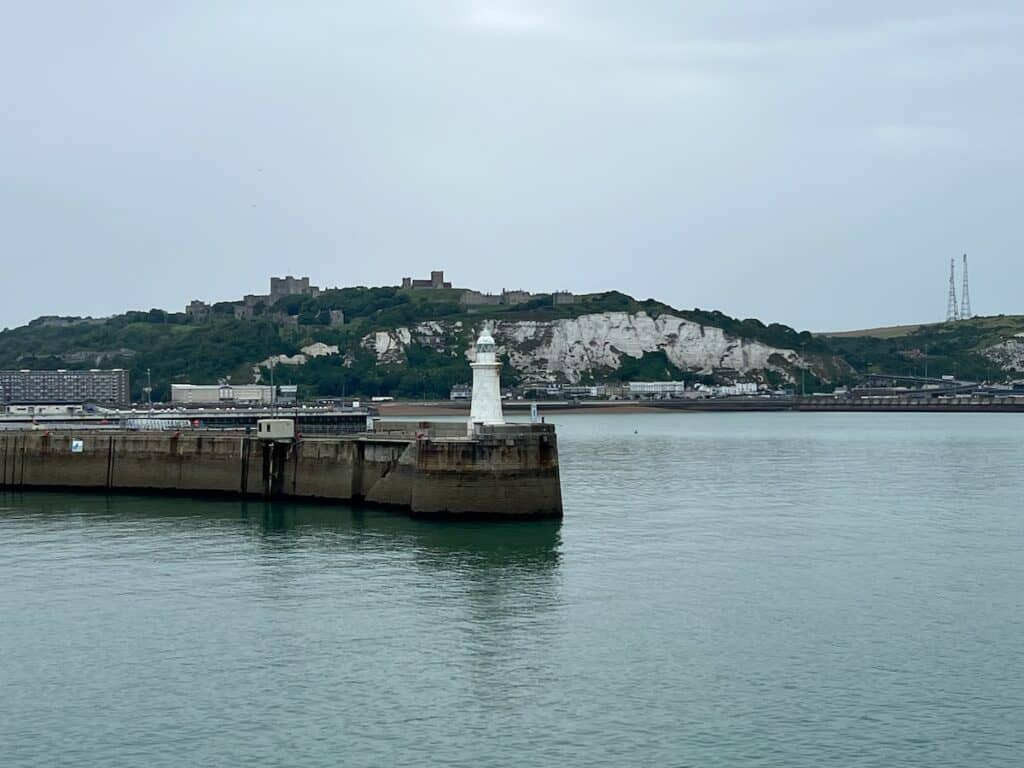 White cliffs of Dover with a light house in the foreground