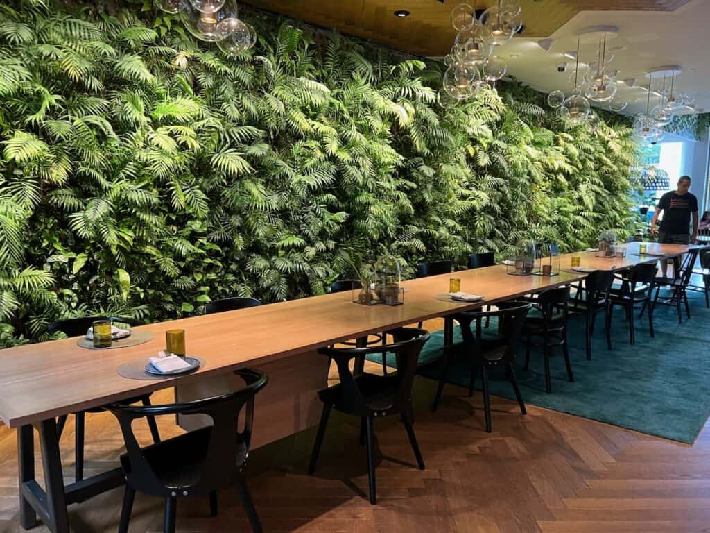 Green wall of plants in the lobby of the Hyatt Regency Amsterdam