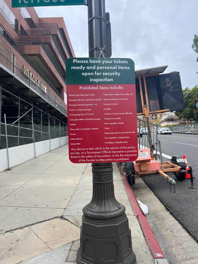 Sign for the rules of entering the grandstand area at the rose parade. You had to have a ticket to enter this area and bags were searched.