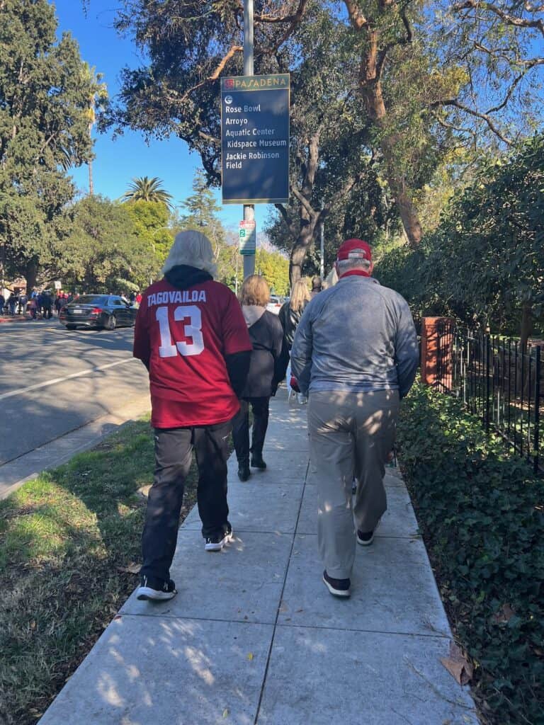 Fans walking to the Rose Bowl after the Rose Parade ended