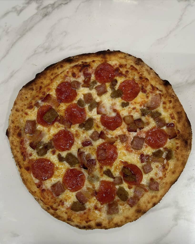 Da grateful dough 4 meat pizza sausage, Italian sausage, bacon and pepperoni
