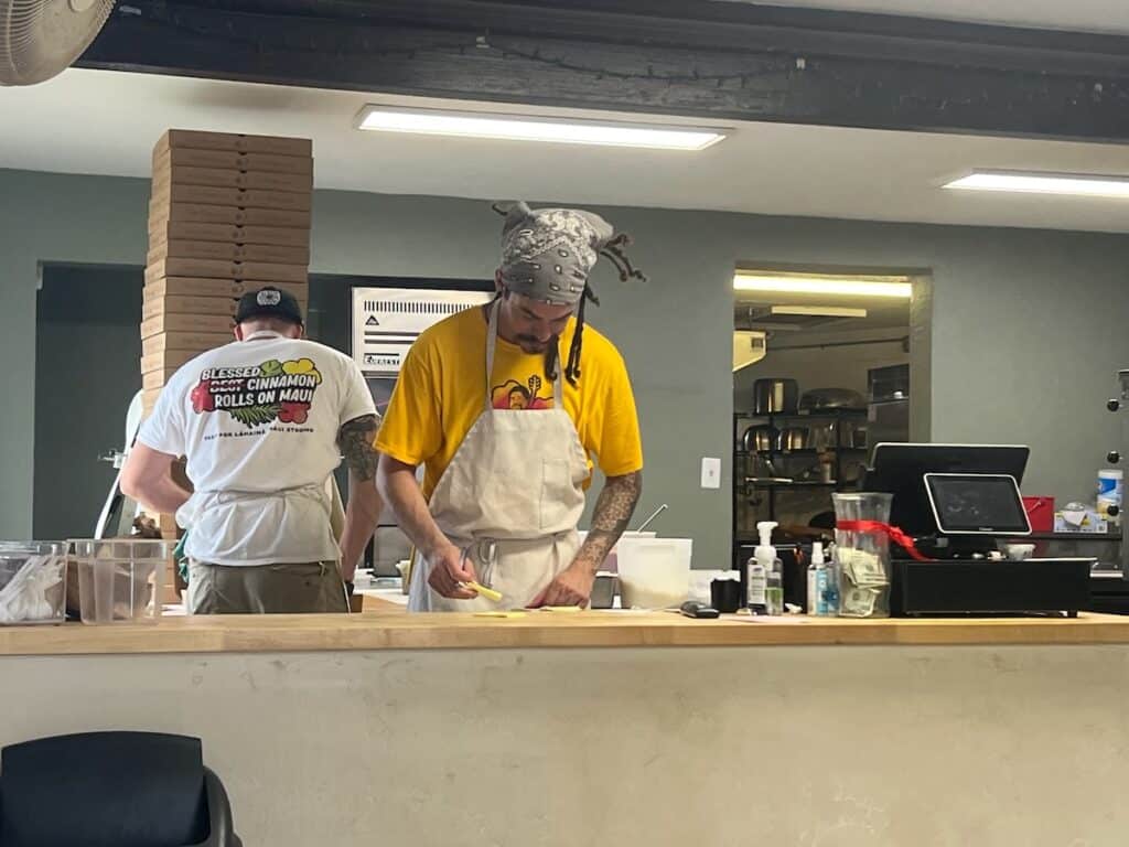 2 men Making Pizza's at Papi's Ohanas on Maui