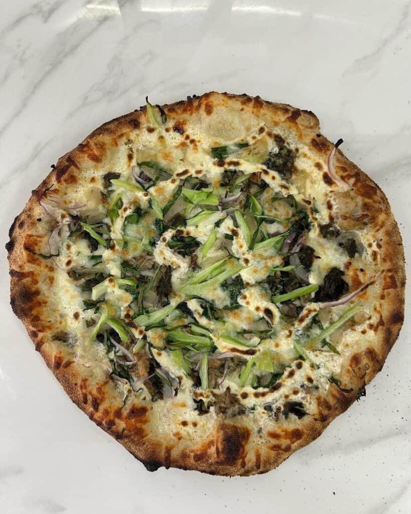Hawaiian Chili Goat Cheese & Baby Bok Choy pizza from Da Grateful Dough Pizza Truck