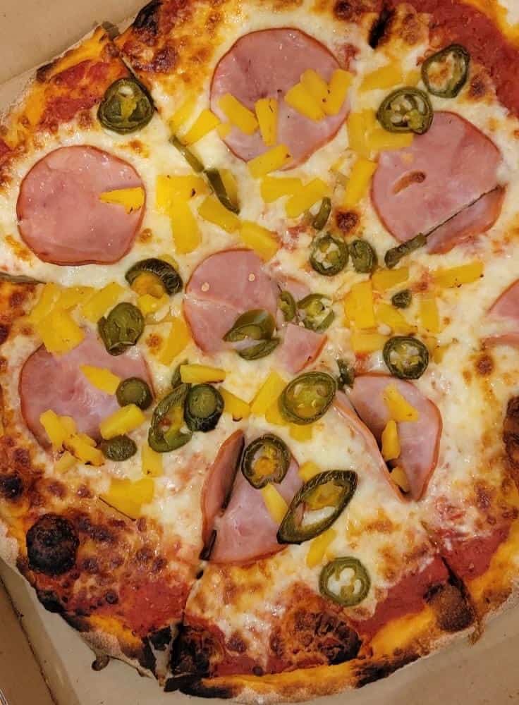 Pizza with ham and pineapple from Papis Ohana Pizza in Kaanapali Maui