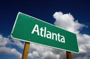 Atlanta Road Sign with dramatic blue sky and clouds - U.S. State Capitals Series.