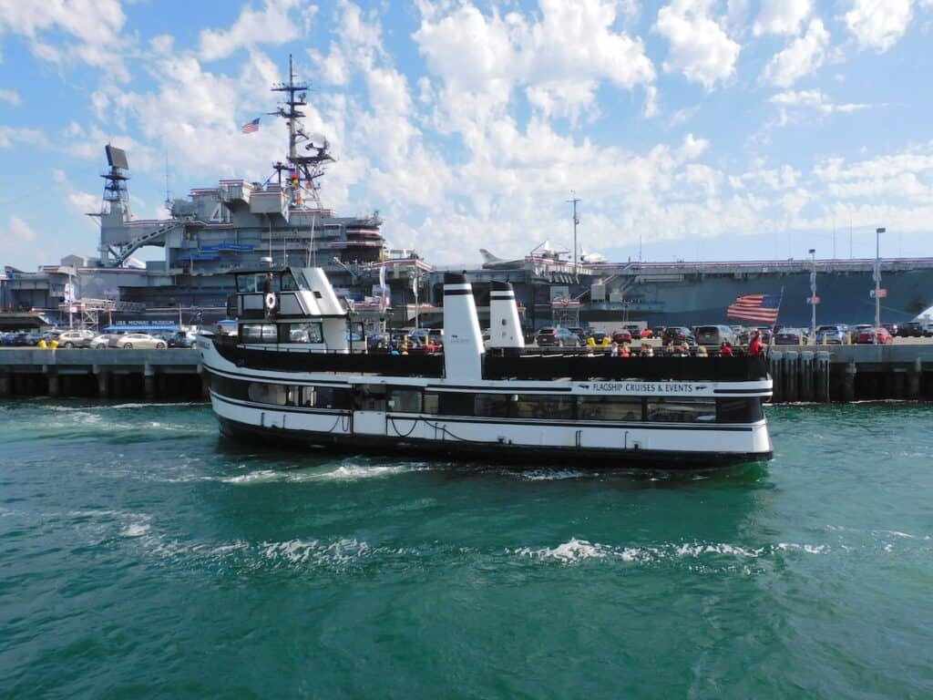 Flagship San Diego Habror tour coming in to the pier next to the Midway aircraft carrier