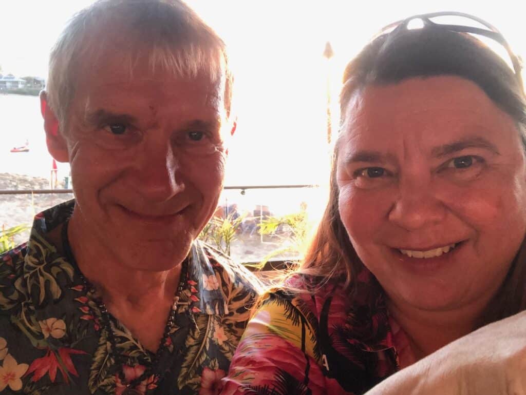 My husband and I in our hawaiian shirts eating at Sea House