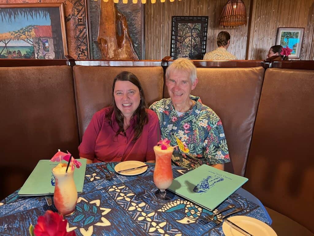 Me and my husband eating at Mama's Fish House with him in an aloha shirt