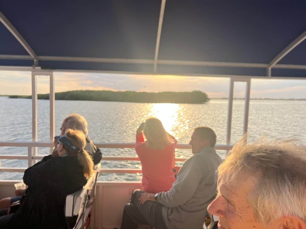 Our Friends watching the sunset on our Indian River Pontoon Boat Tour