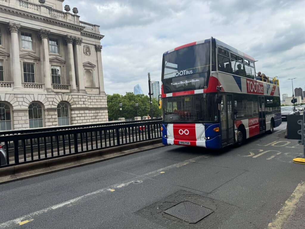 TootBus Hop On Hop Off Tour on a street in London