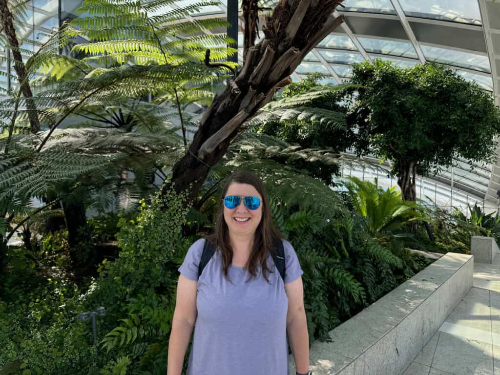 Me standing in front of the garden area in the Sky Garden