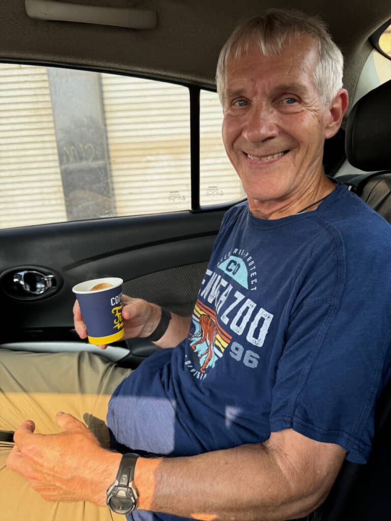 My husband with a fresh cup of Egyptian Coffee