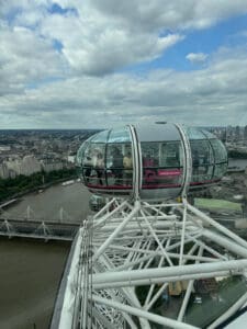 London Eye capsule near the top with the Thames river in the background