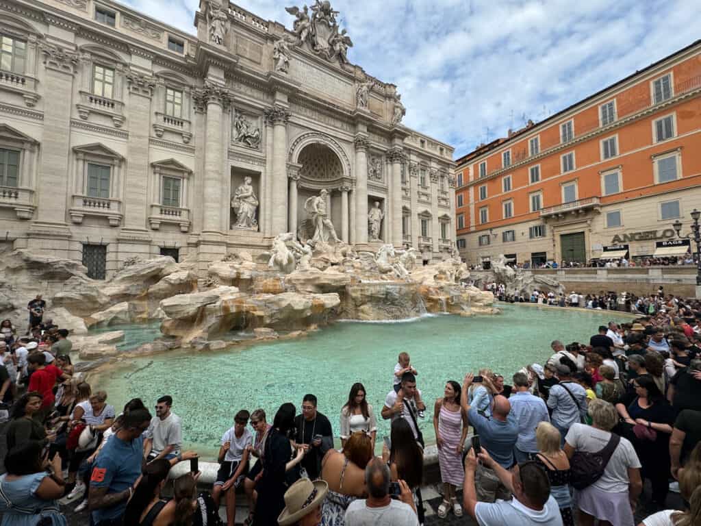Lots of tourist around trevi fountain