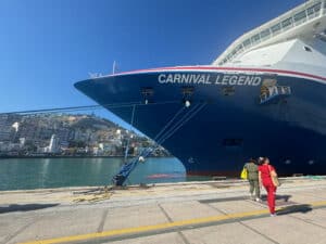 Carnival Legend Cruise Ship with the Kusadasi sign in the background
