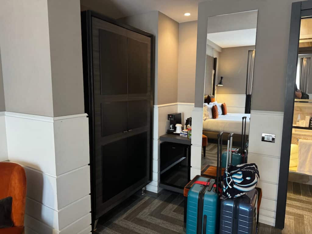 Closet and mini bar in our room at the Tribune in Rome