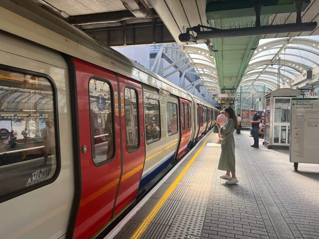Lady waiting to board the London Tube