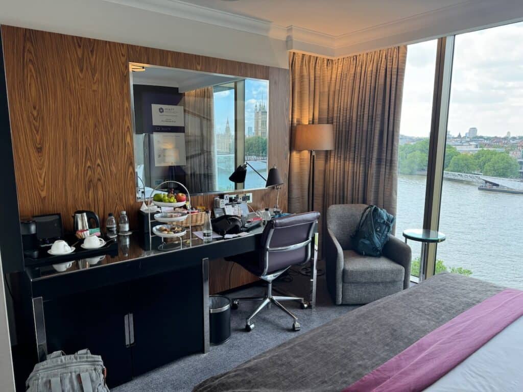 Desk, TV and chair area in our room at Hyatt Regency London Albert Embankment Hotel