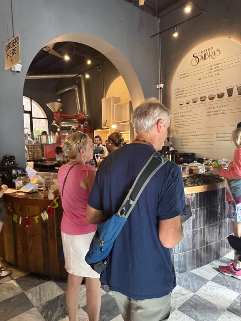 People waiting on coffee at Cuartro Sombras coffee house in Old San Juan