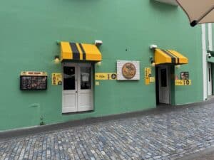 Don Tako green building with yellow awnings in San Juan Puerto Rico