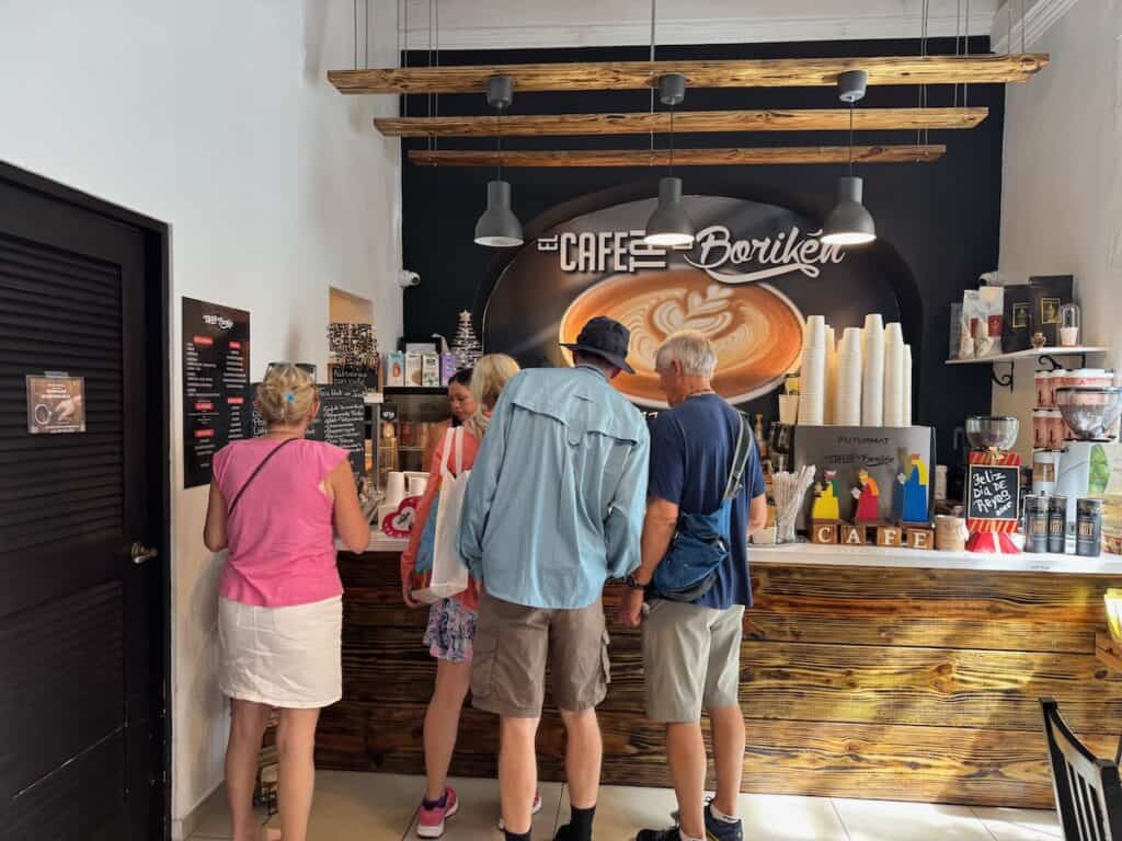 Our friends inside El Cafe Tal De Boriken in Old San Juan deciding what to order