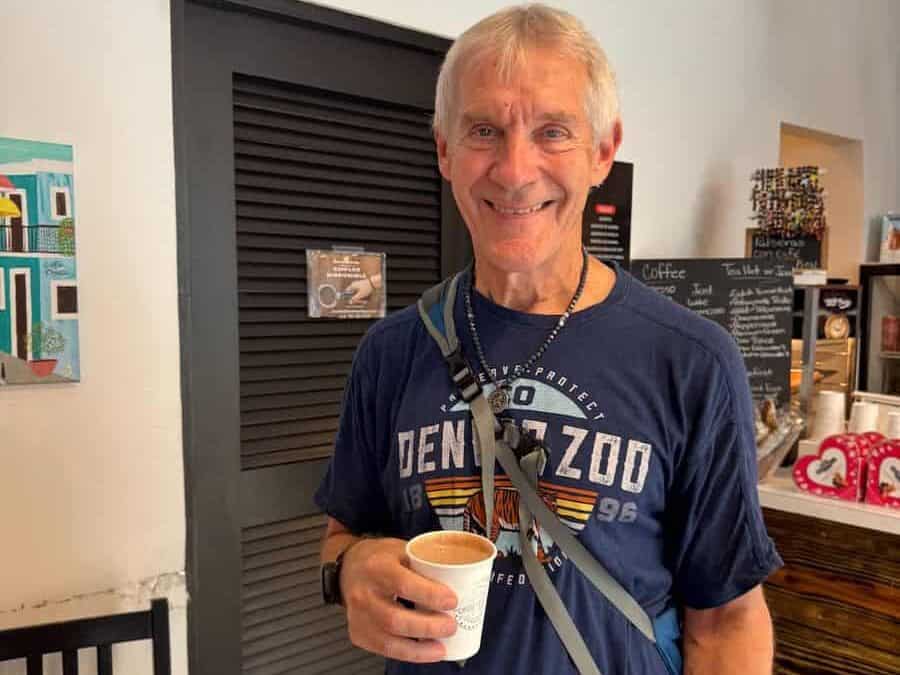 My husband with a hot chocolate from El Cafe Tal De Boriken in Old San Juan