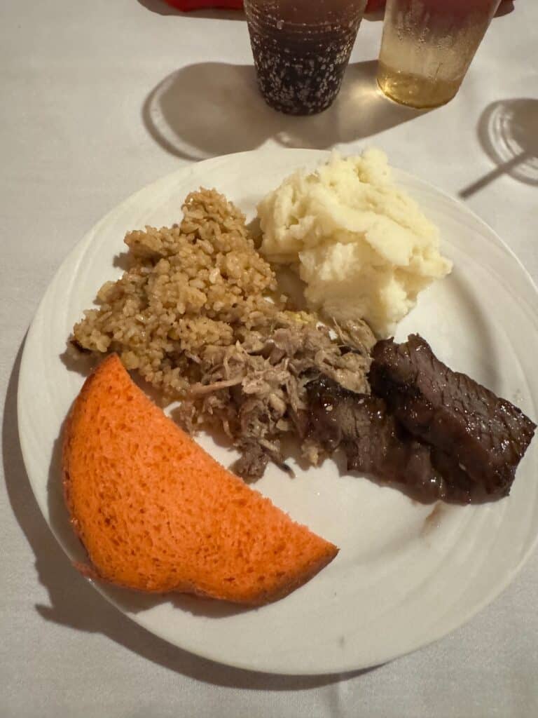 Roasted Pork, Teriki Beef, Fried Rice, mashed potatos and a guave bread at the luau