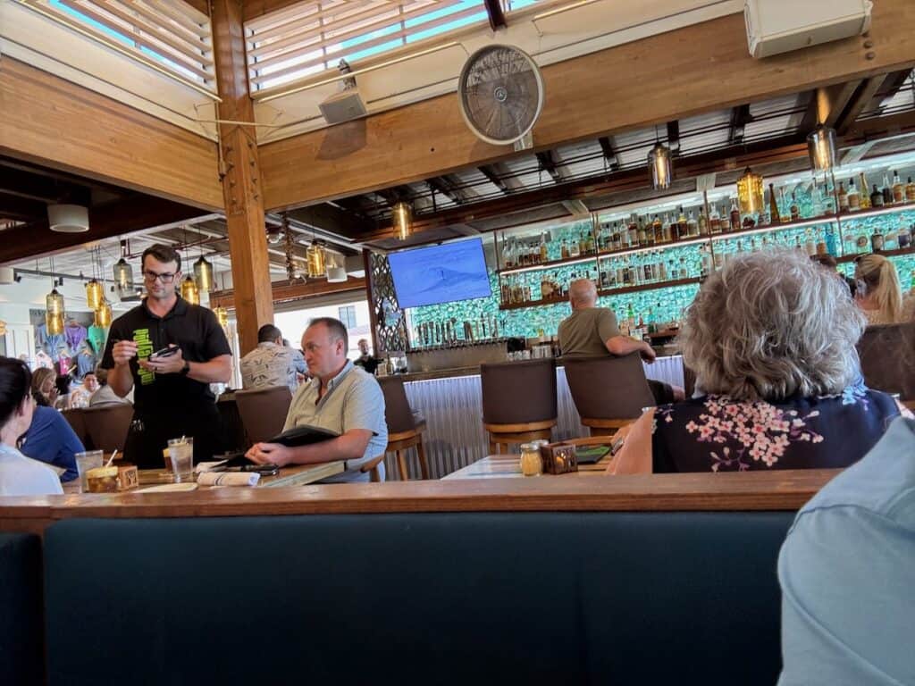 View of people inside of monkeypod kaanapali
