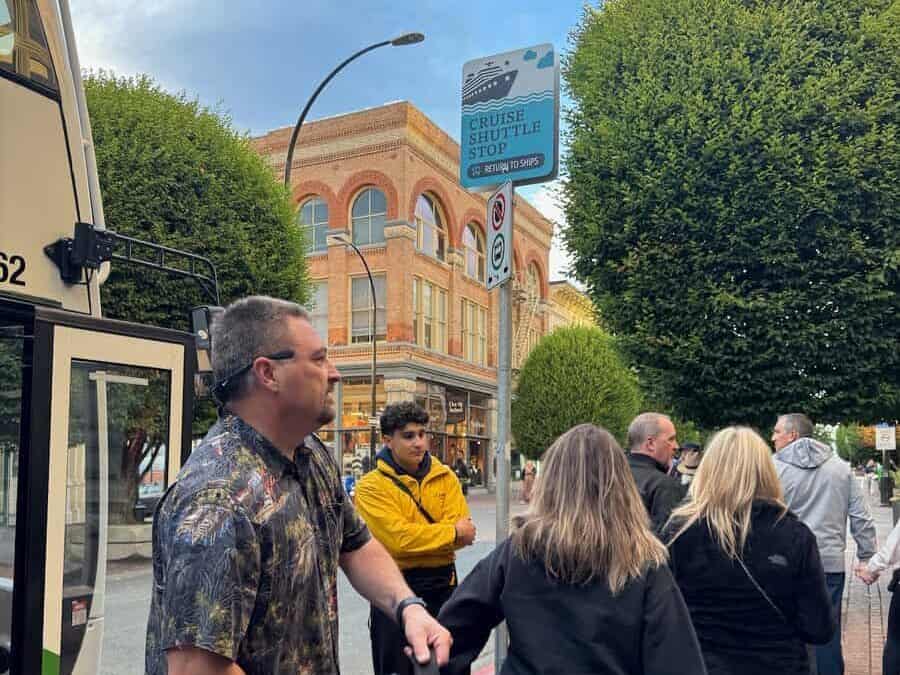 Cruise folks getting out off shuttle in downtown Victoria