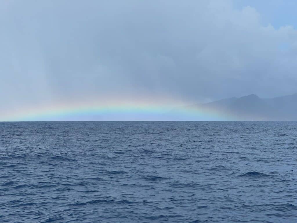 Pretty rainbow with the Dominica island behind it