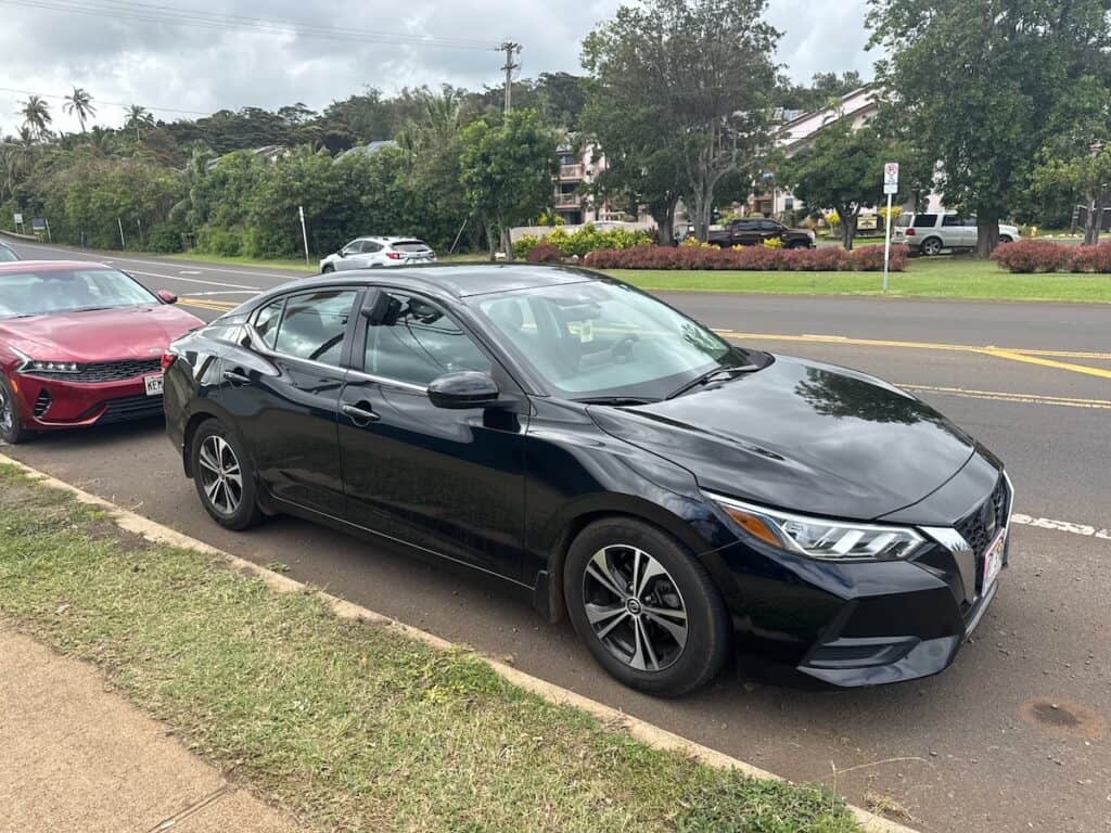Our Kauai Island Rendal Car parked on the street near the cruise port