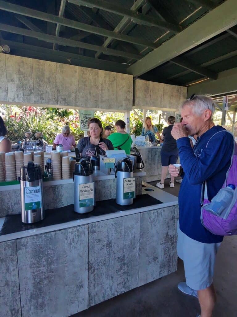 My husband tasting coffee at the Greenwell Coffee Farm