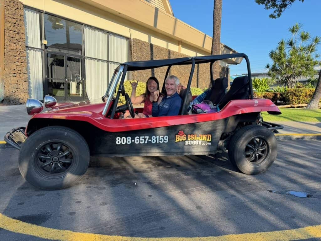 My husband and I giving the Shaka hand signal when leaving with our Big Island Buggy