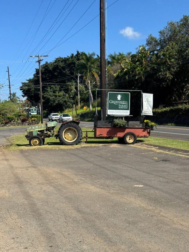 Greenwell Farms sign at the entrance of the parking lot on the big island
