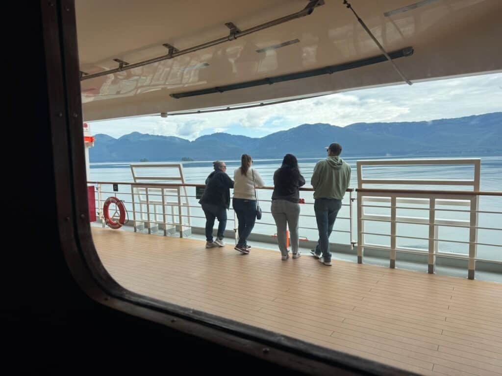 Whale watching from the deck of an Alaska Cruise