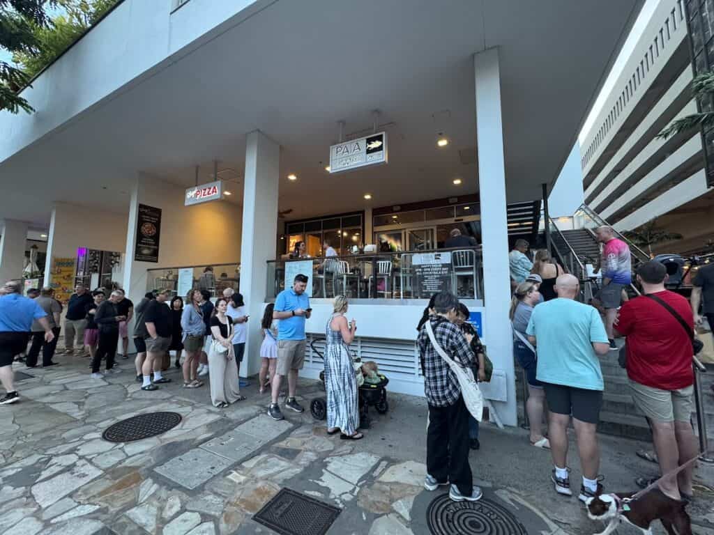 Line out side the Paia Fish Market in the evening in Waikiki