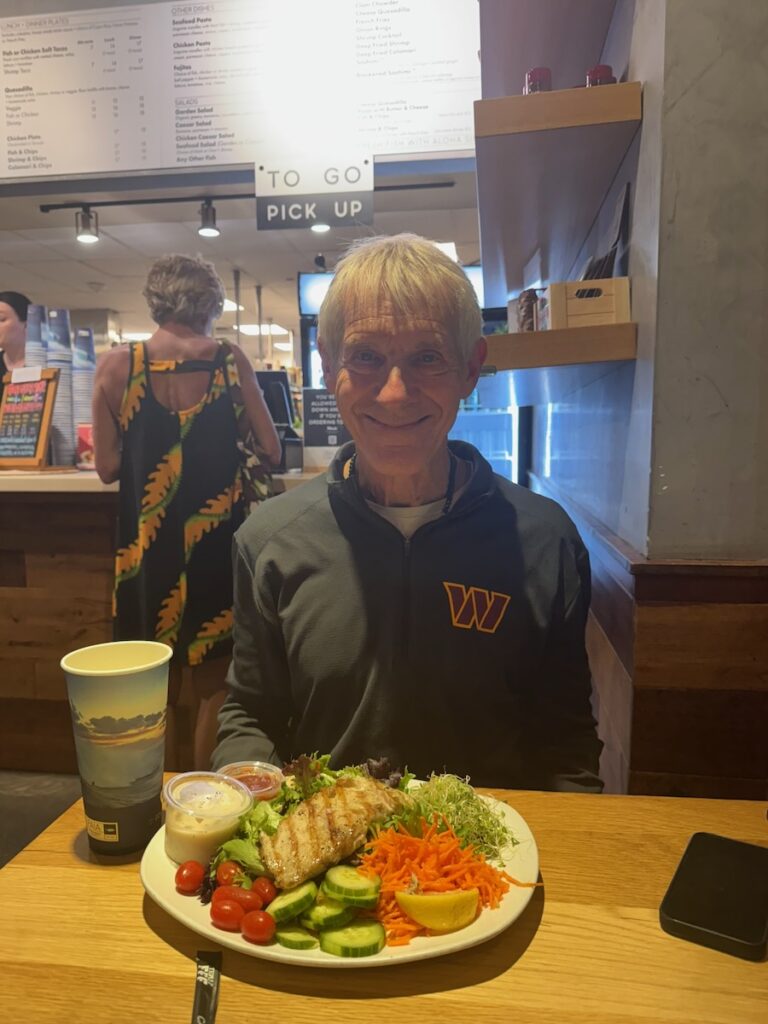 My husband with his Grilled Snapper Salad