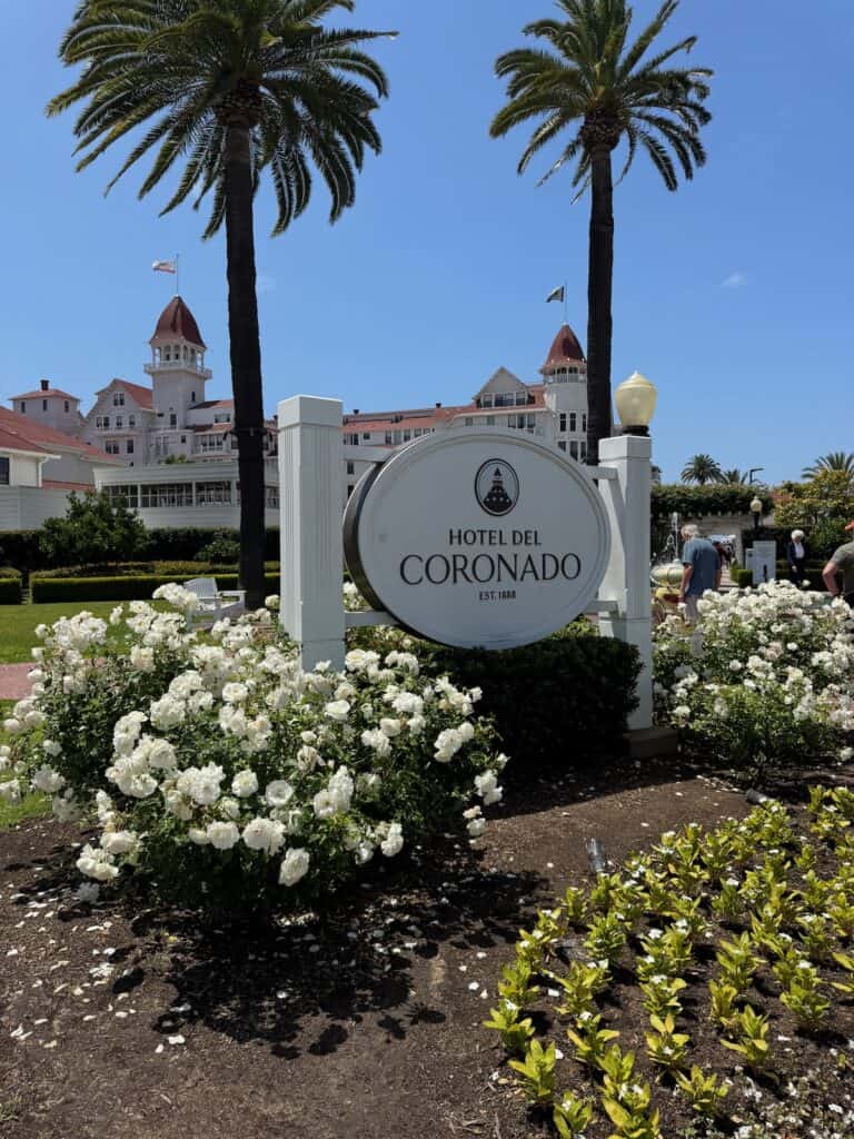 Hotel Del Coronado sign with the hotel in the background