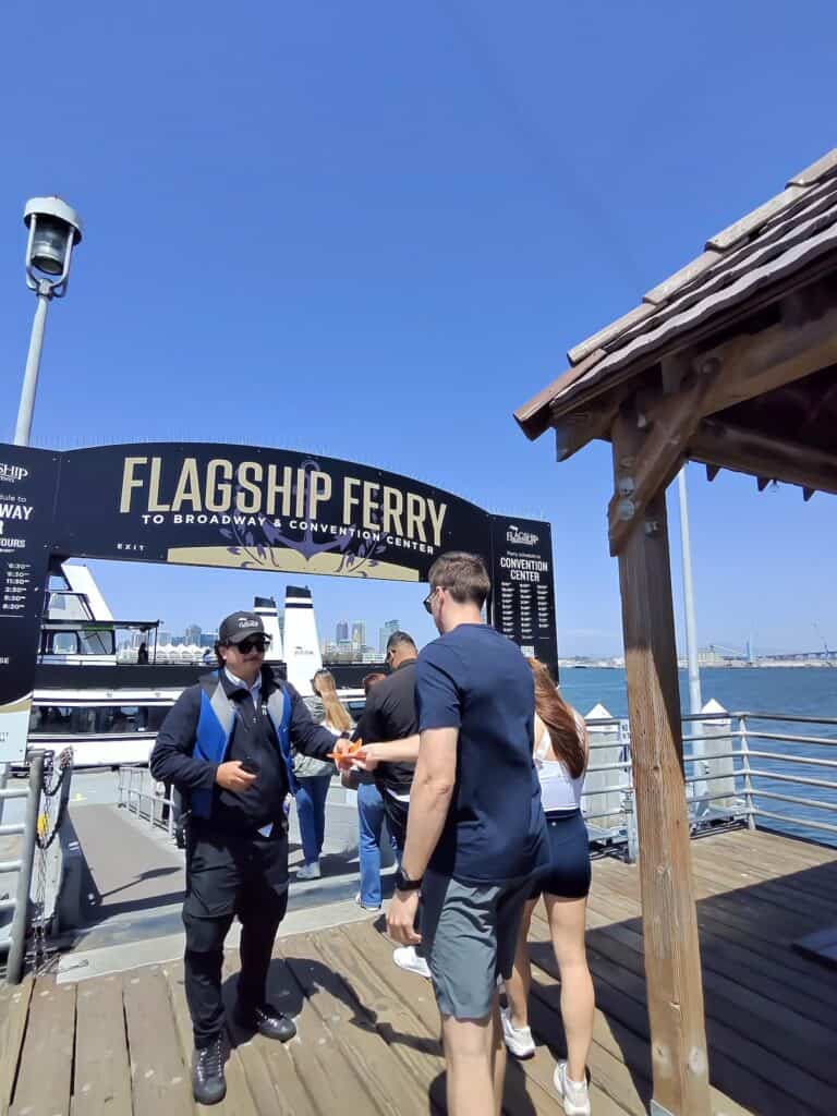 Ticket taker getting on the Coronado Ferry