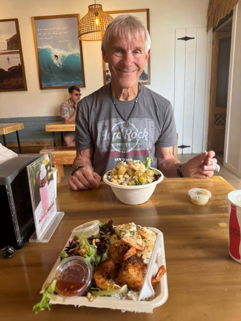 My husand enjoying his salad at Seven brothers Kahuku